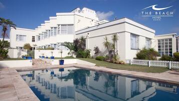 Outdoor pool, open 7:00 AM to 6:00 PM, pool umbrellas, pool loungers