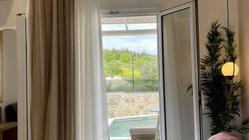 Junior Suite, Private Pool | Iron/ironing board, individually furnished, bed sheets