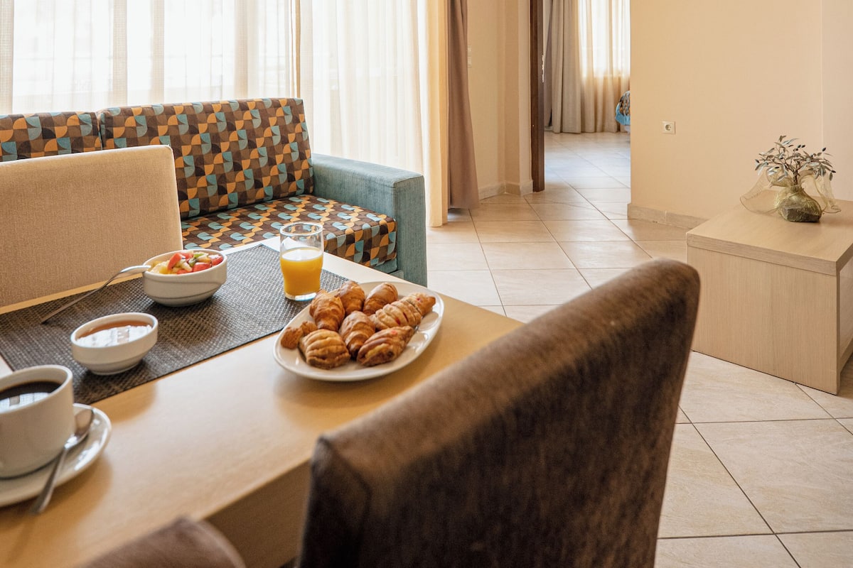 Comfort Suite, 1 Bedroom, Partial Sea View | Desk, blackout drapes, soundproofing, iron/ironing board