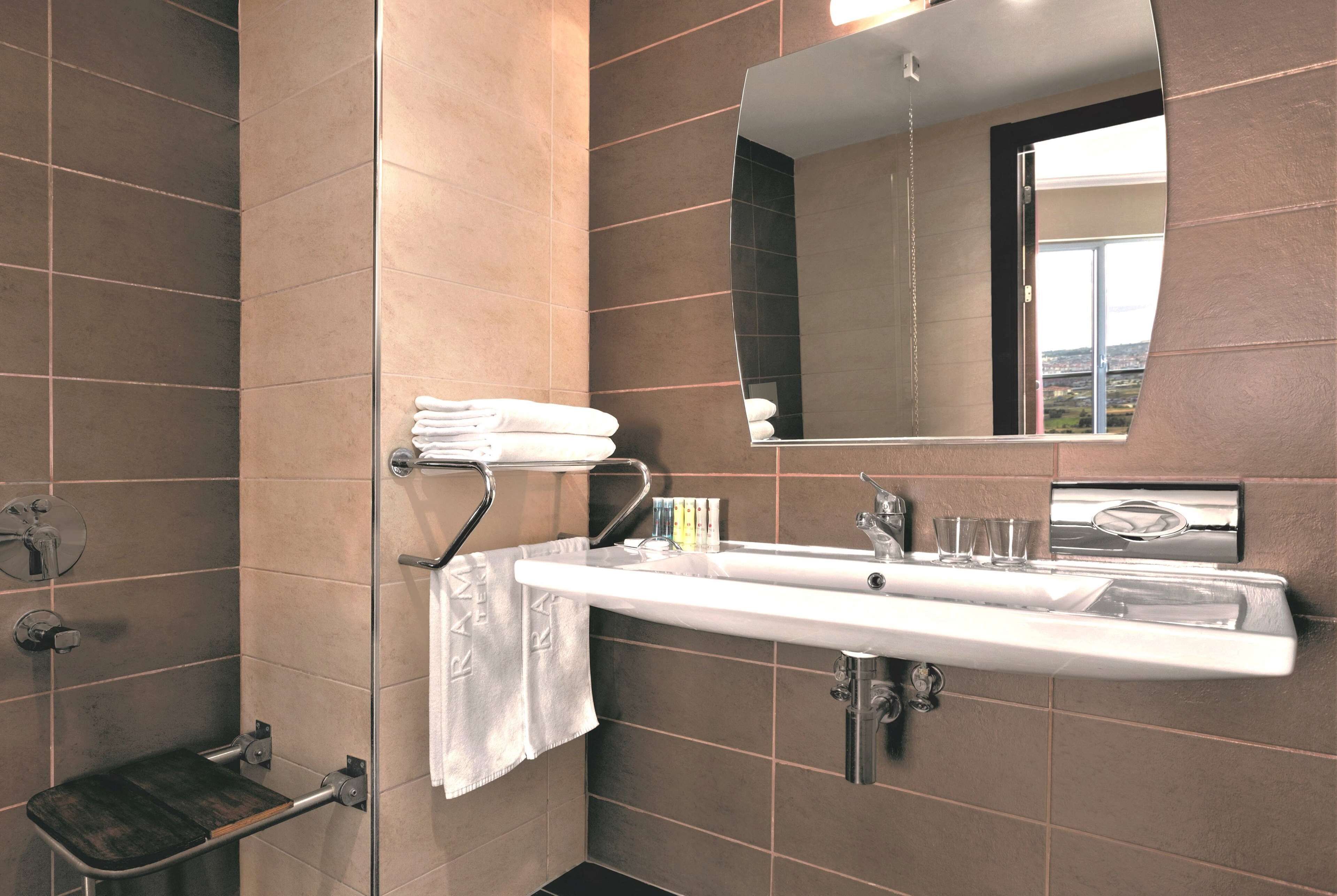 deluxe room, 1 king bed, accessible, non smoking (sea and city view) | bathroom | hair dryer, slippers, towels, soap