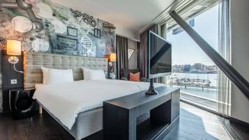 Suite, 1 Bedroom, River View | 1 bedroom, in-room safe, laptop workspace, blackout drapes