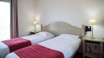 Twin kamer | Een bureau, geluiddichte muren, gratis wifi, beddengoed