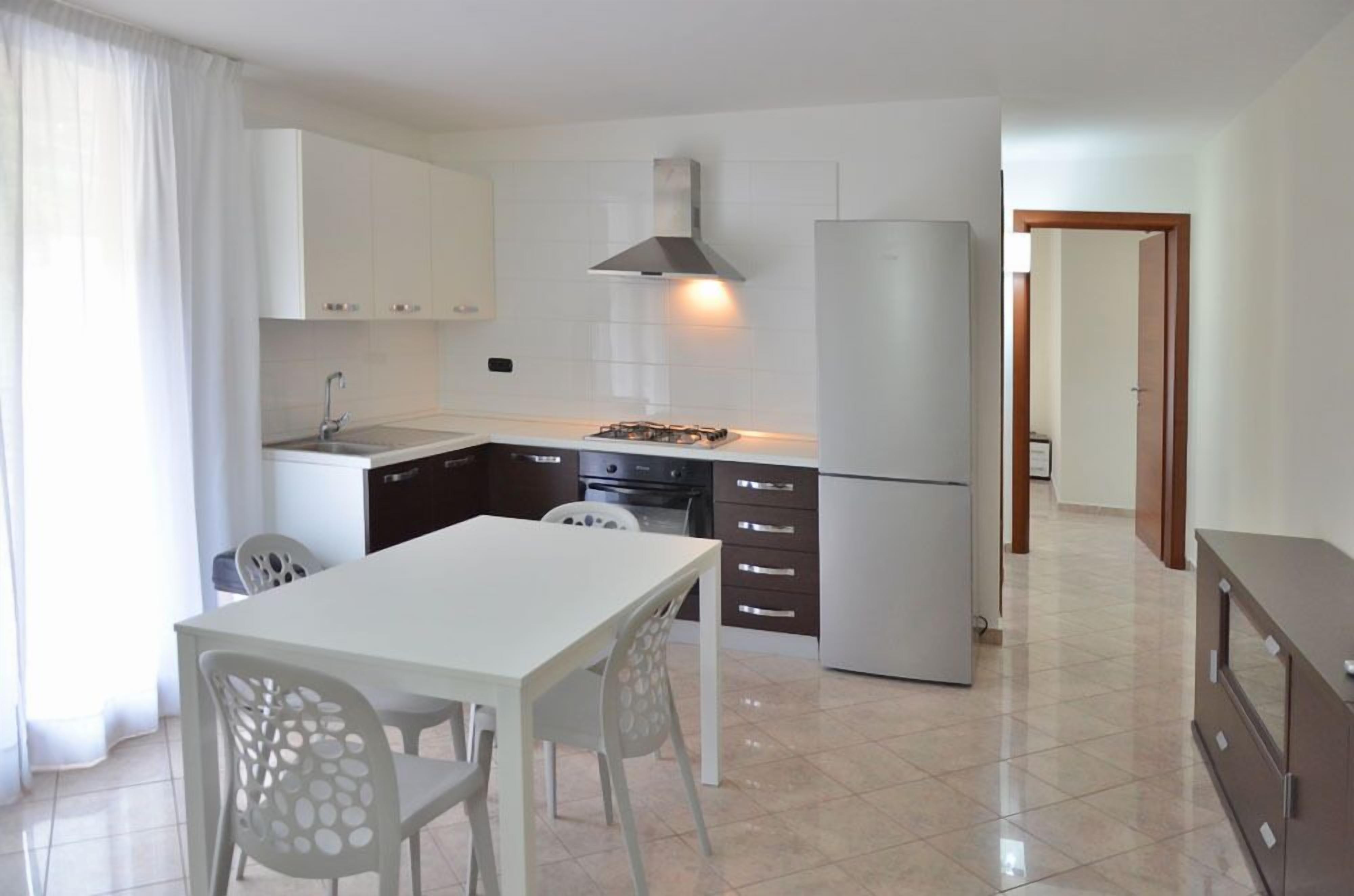 apartment, 1 bedroom, kitchen | minibar, in-room safe, desk, blackout curtains