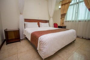 Premium bedding, down duvets, pillow-top beds, individually decorated