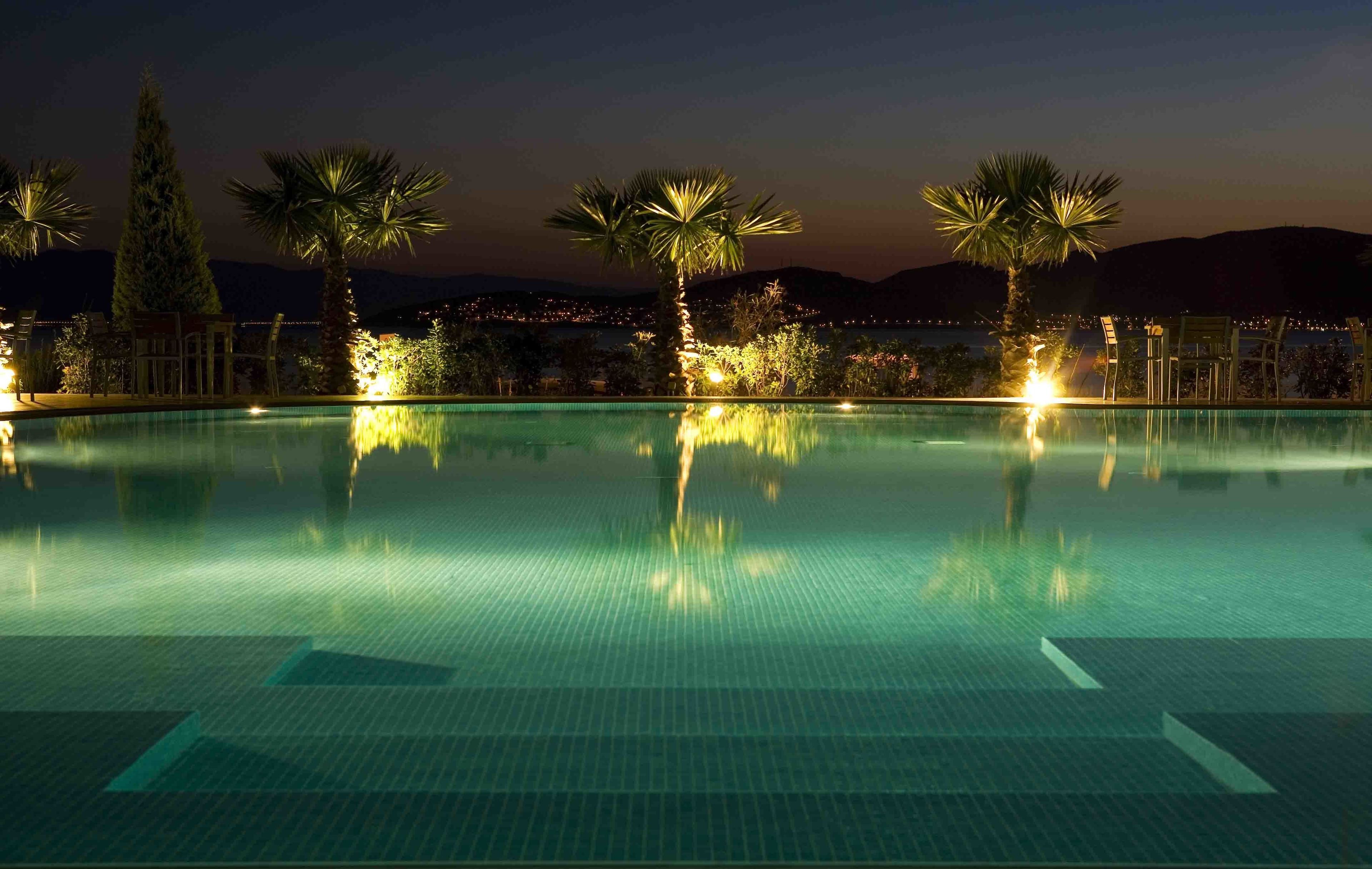 indoor pool, outdoor pool, pool umbrellas, pool loungers