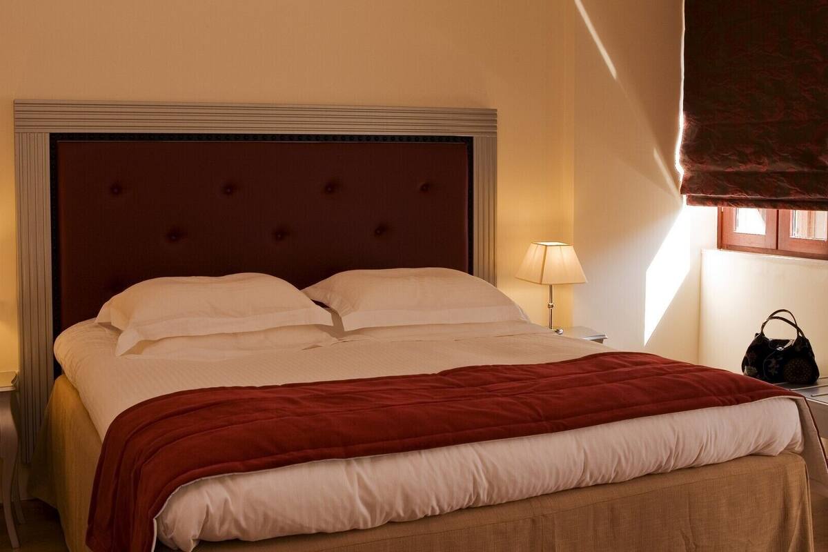 Premium bedding, pillow-top beds, minibar, in-room safe