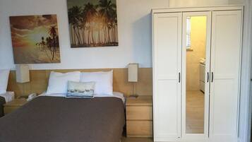 Habitación familiar, 2 camas matrimoniales | Ropa de cama de alta calidad y decoración personalizada