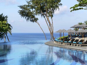 2 outdoor pools, open 7:00 AM to 7:00 PM, pool umbrellas, sun loungers