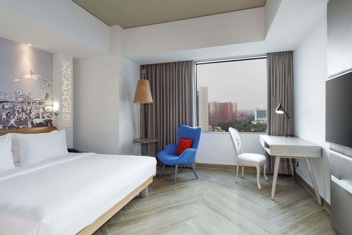 Privilege, Room, 1 King Bed | 8 bedrooms, in-room safe, desk, iron/ironing board