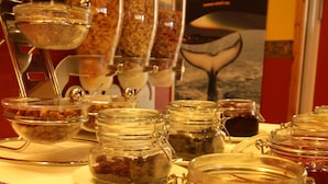 A variety of food items in glass containers on a table. - Tysfjord Turistsenter (Hamaroy)