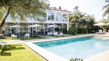 2 outdoor pools, open 9:00 AM to 7:00 PM, pool umbrellas, sun loungers