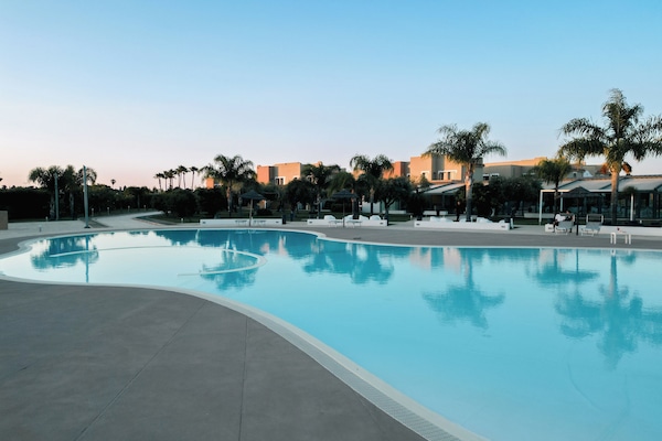 Seasonal outdoor pool, pool umbrellas, sun loungers