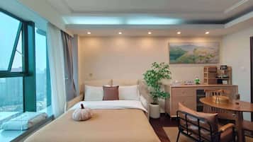 Grand Duplex, Bathtub, City View | In-room safe, desk, blackout drapes, iron/ironing board