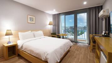 Premium bedding, down comforters, individually decorated