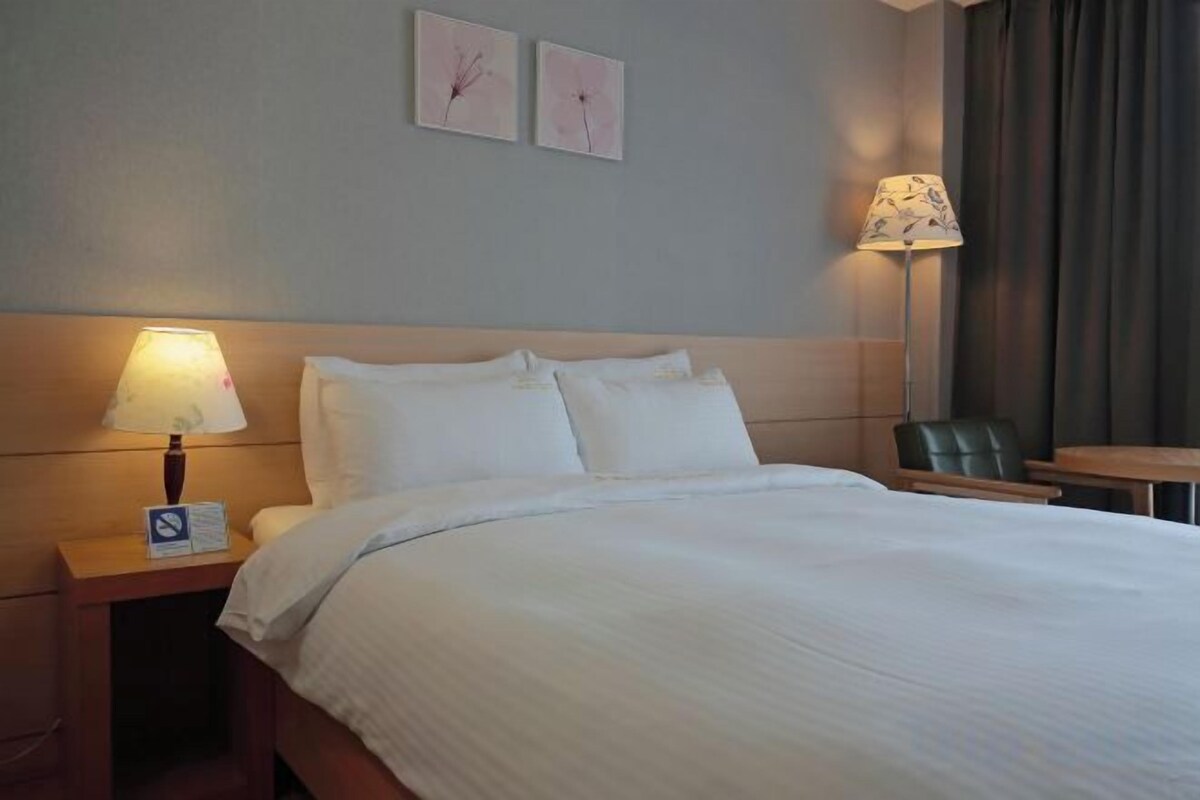 Premium bedding, down comforters, blackout drapes, WiFi (free)