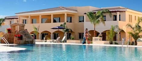 2 outdoor pools, pool umbrellas, pool loungers