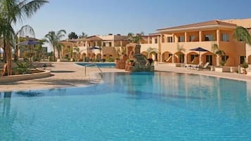 2 outdoor pools, pool umbrellas, pool loungers
