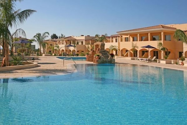 2 outdoor pools, pool umbrellas, sun loungers