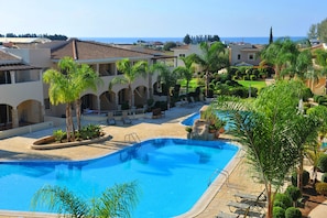 2 outdoor pools, pool umbrellas, pool loungers