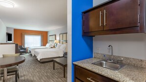 A hotel room with two beds, a desk, and a kitchenette with a sink. - Holiday Inn Express Hotel & Suites Albert Lea - I-35 by IHG (Albert Lea)