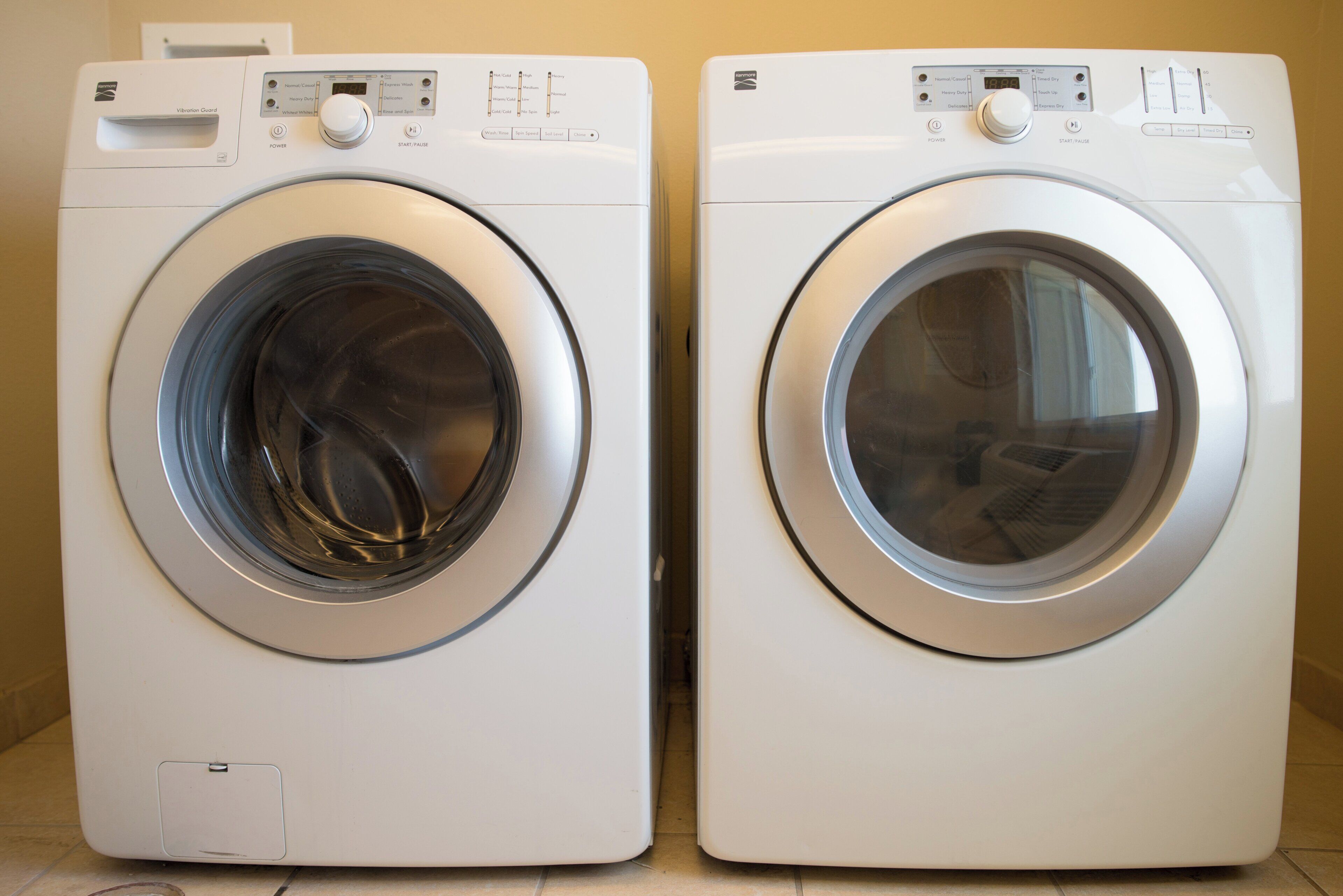 Two front-loading washing machines side by side.