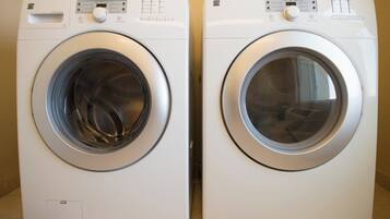 Two front-loading washing machines side by side.