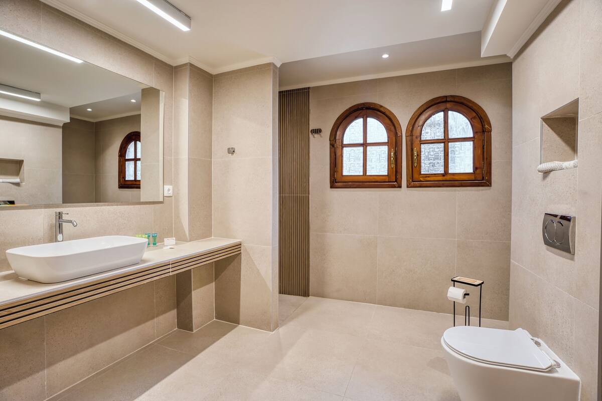 comfort double or twin room (villa building) | bathroom | free toiletries, hair dryer, slippers, towels