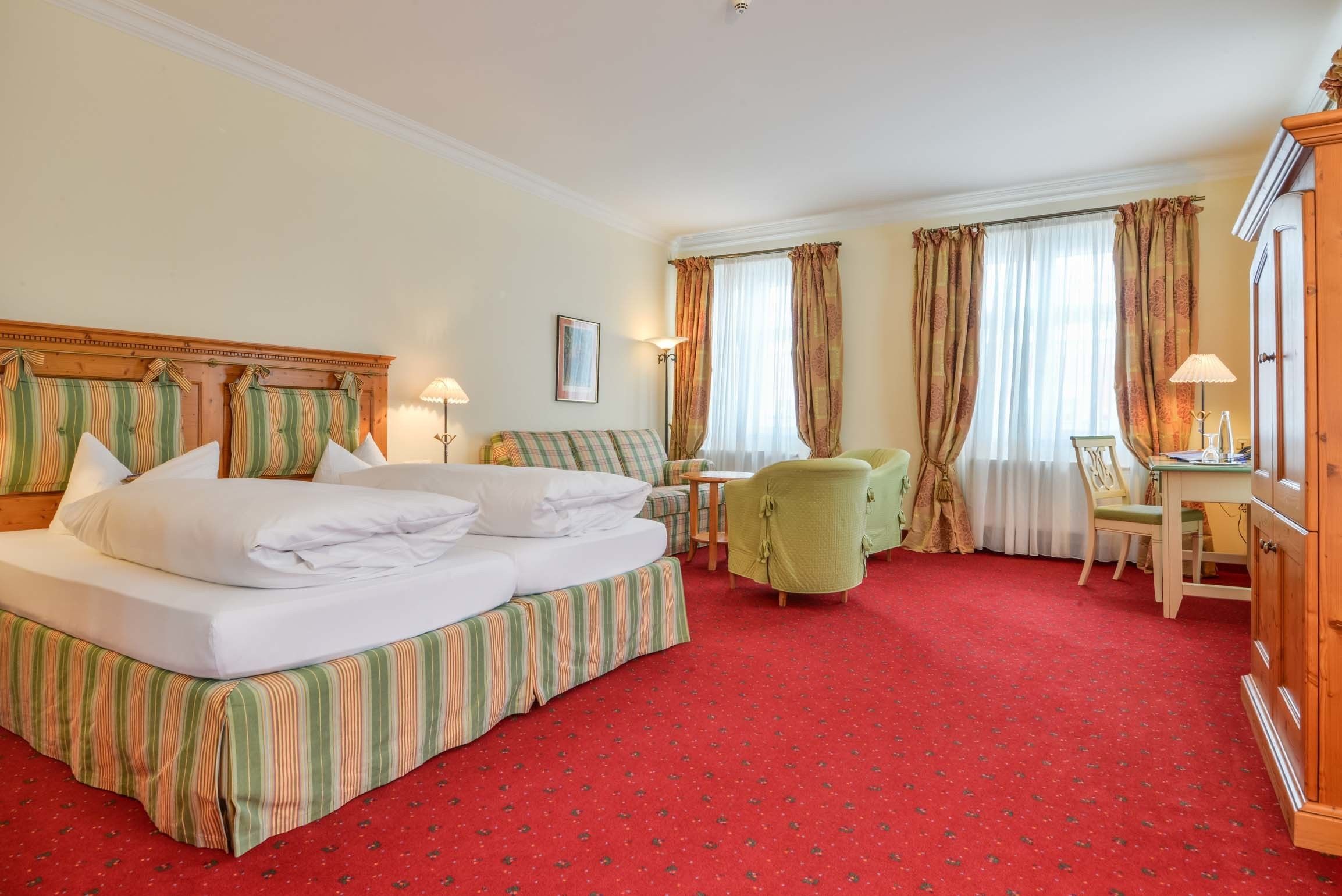 hypo-allergenic bedding, down duvets, in-room safe, desk