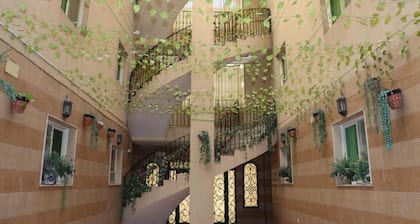 Al Alya Hotel Rooms and Suites