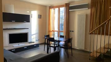 Apartment, 2 Bedrooms | Living area | Flat-screen TV, DVD player