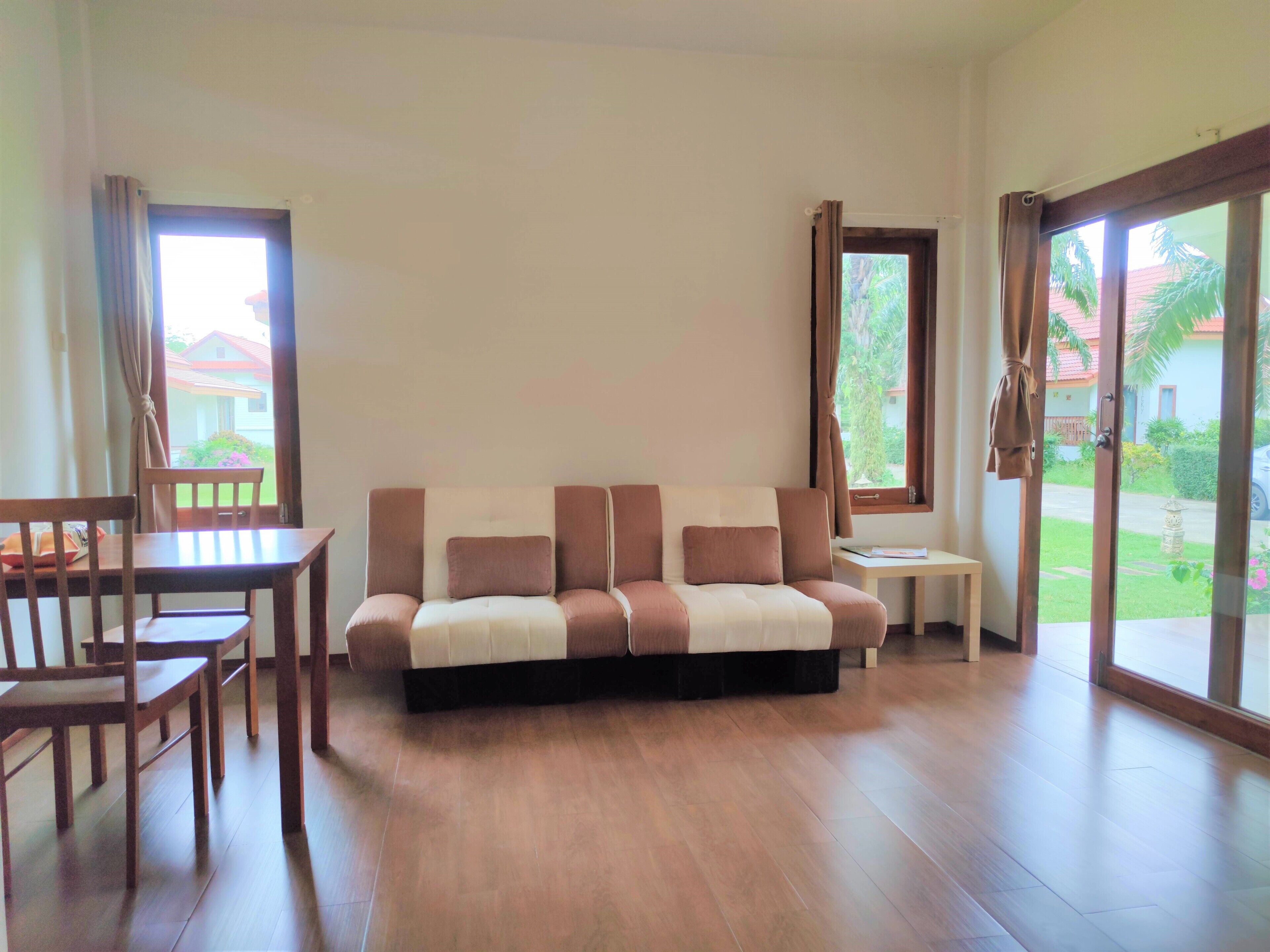 villa, 1 bedroom | living room | 32-inch lcd tv with satellite channels, tv, dvd player