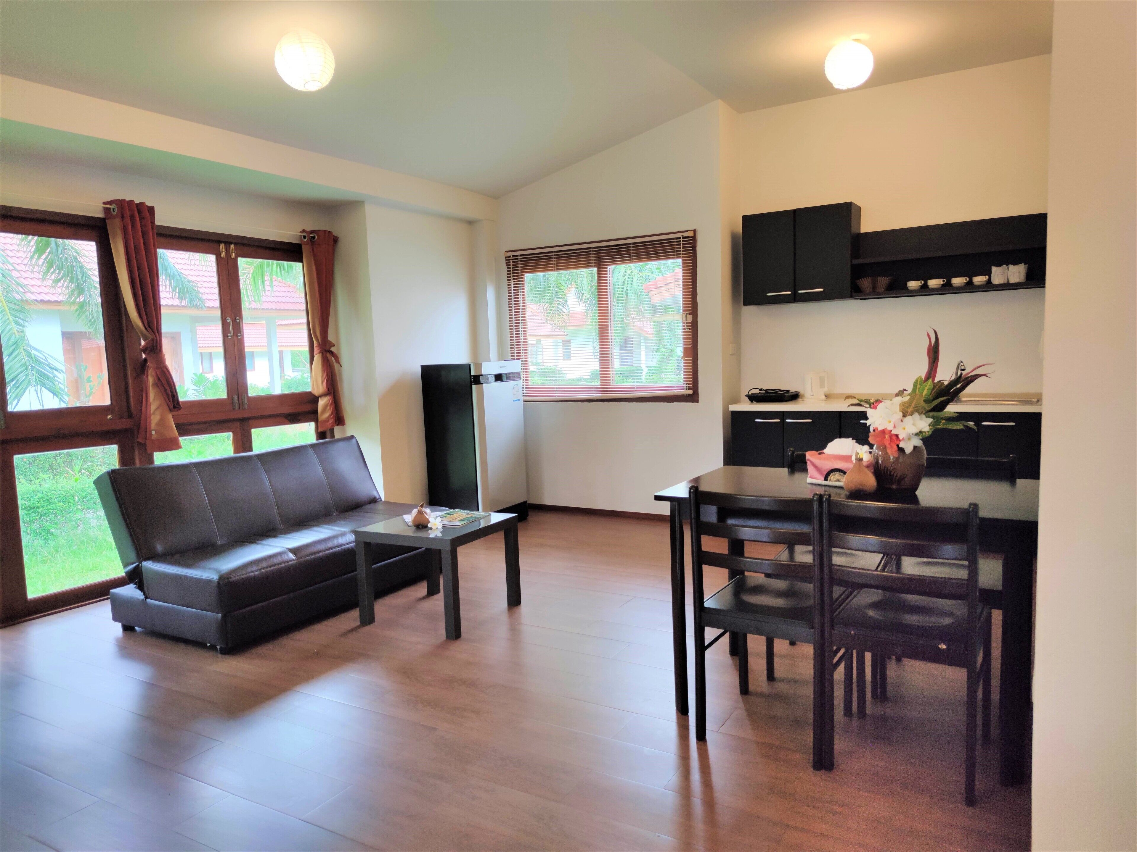 villa, 2 bedrooms, smoking, park view | living room | 32-inch lcd tv with satellite channels, tv, dvd player