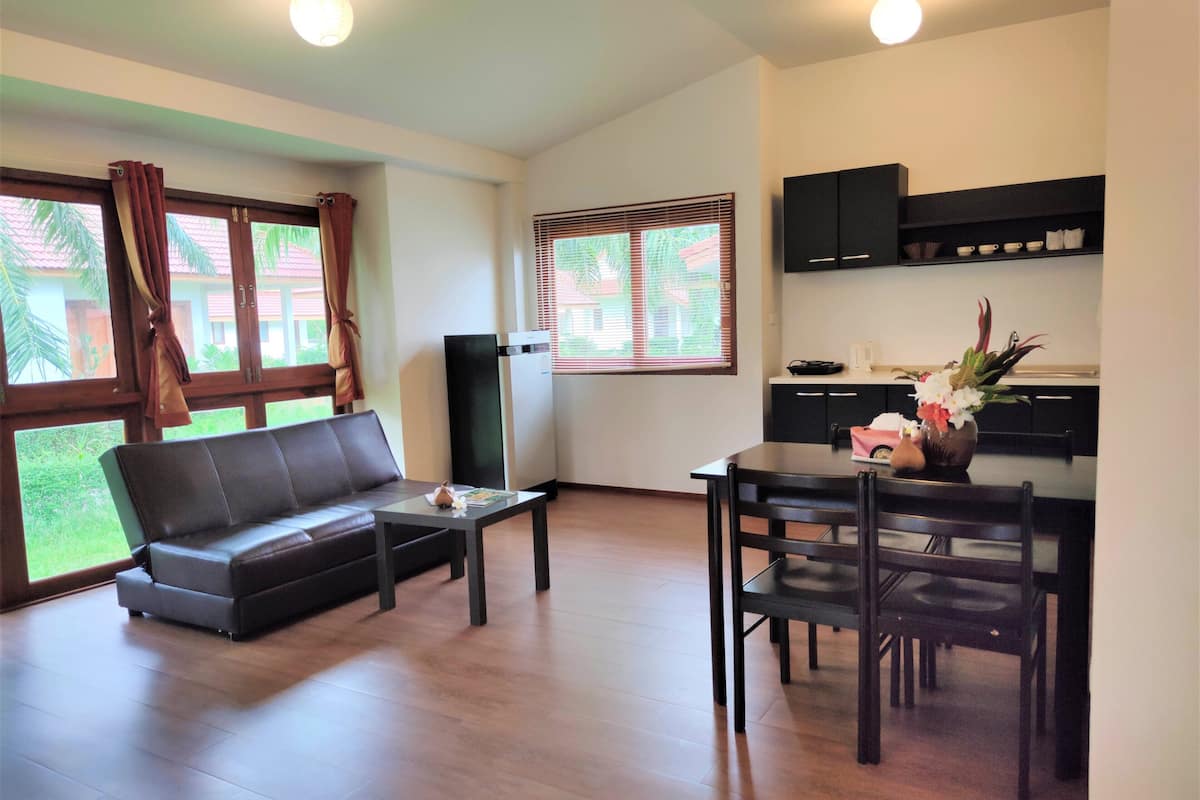 villa, 2 bedrooms, smoking, park view | living room | 32-inch lcd tv with satellite channels, tv, dvd player