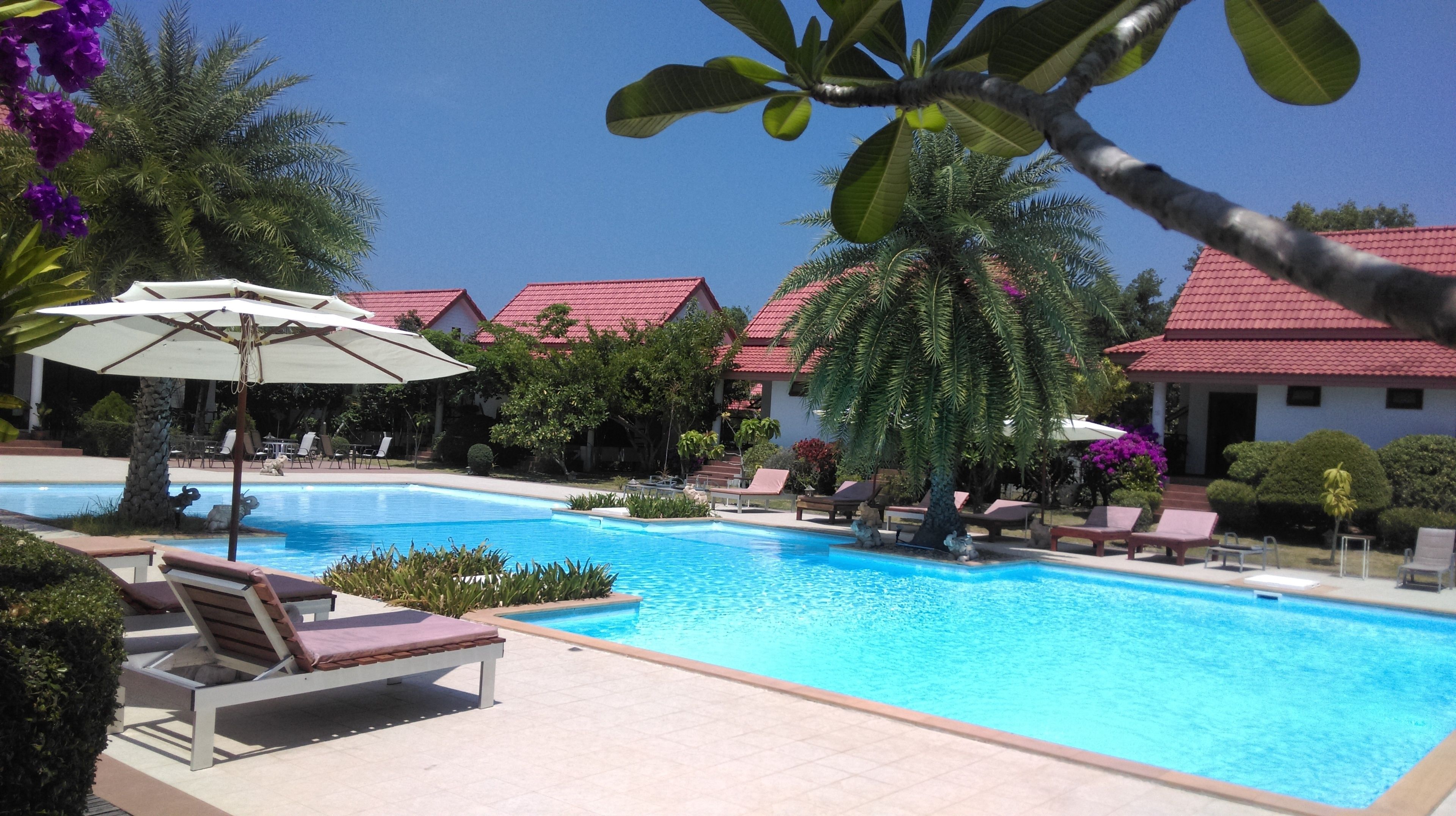 2 outdoor pools, pool umbrellas, pool loungers