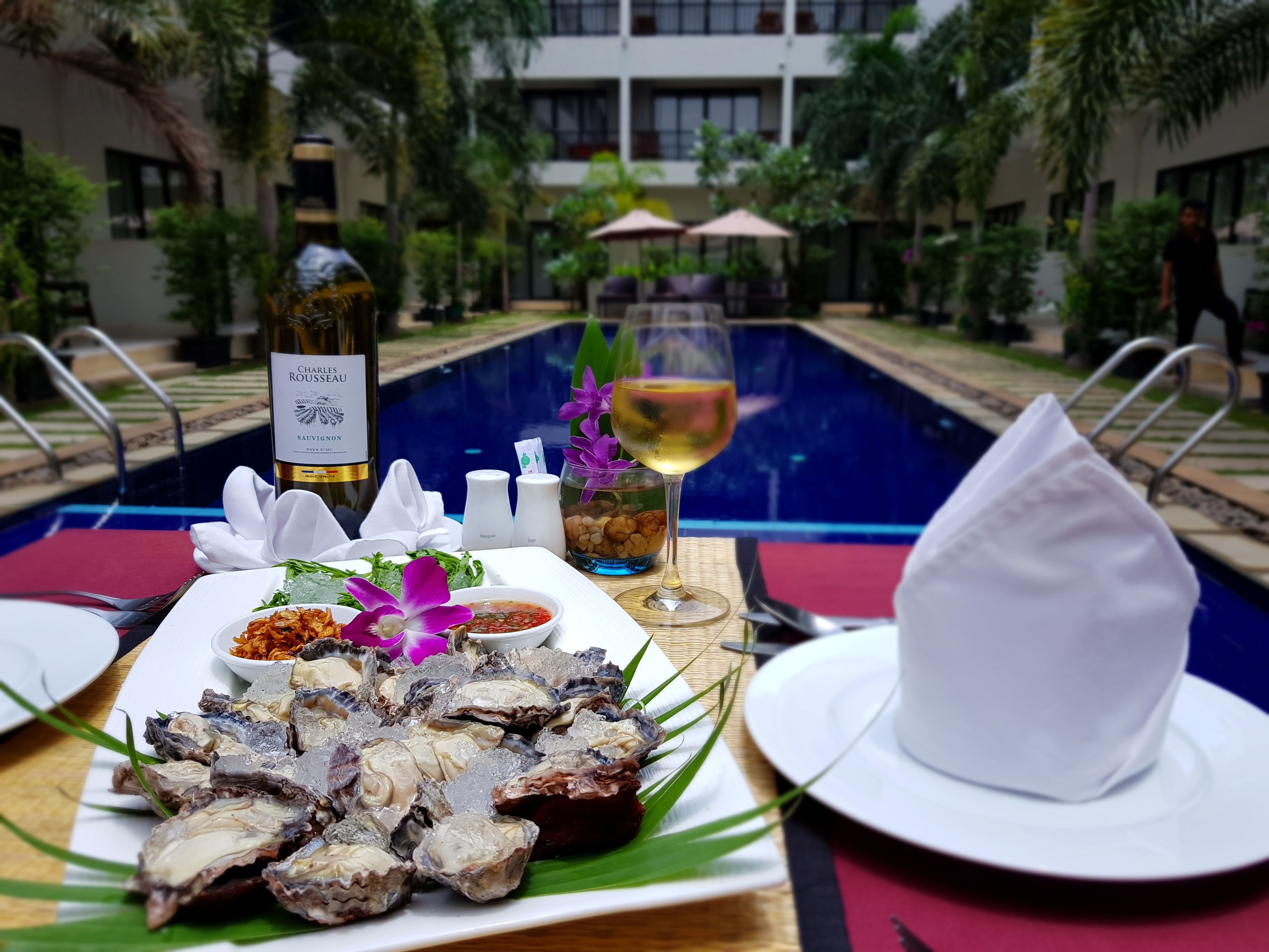 Outdoor pool, pool umbrellas, sun loungers