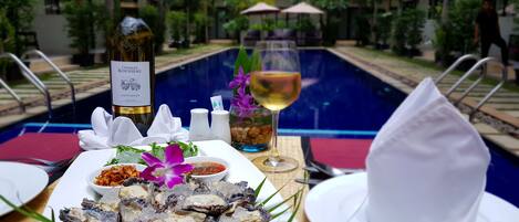 Outdoor pool, pool umbrellas, pool loungers