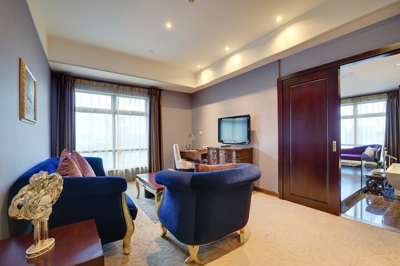 family triple room | living area | lcd tv