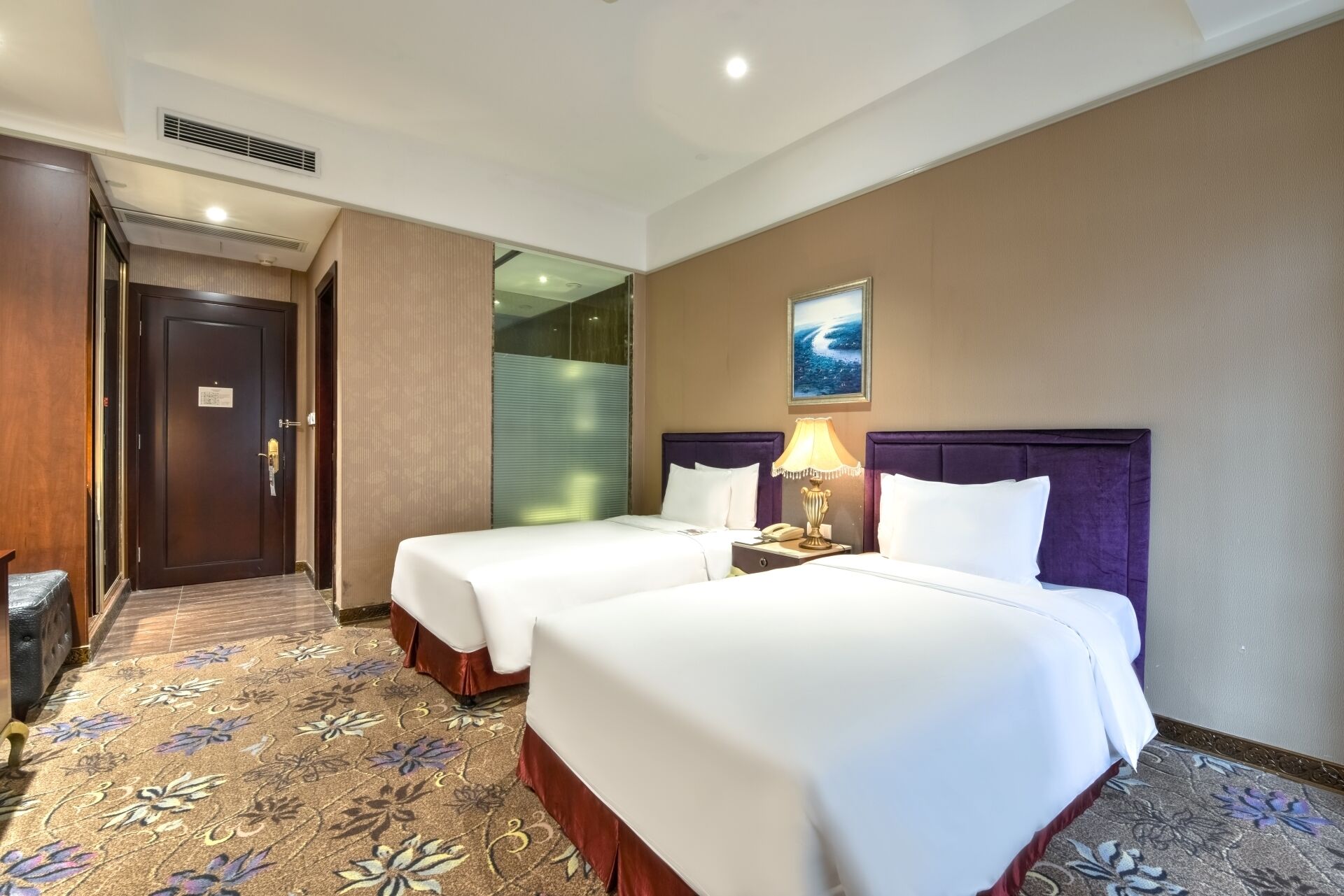 standard twin room | premium bedding, down duvets, memory-foam beds, desk