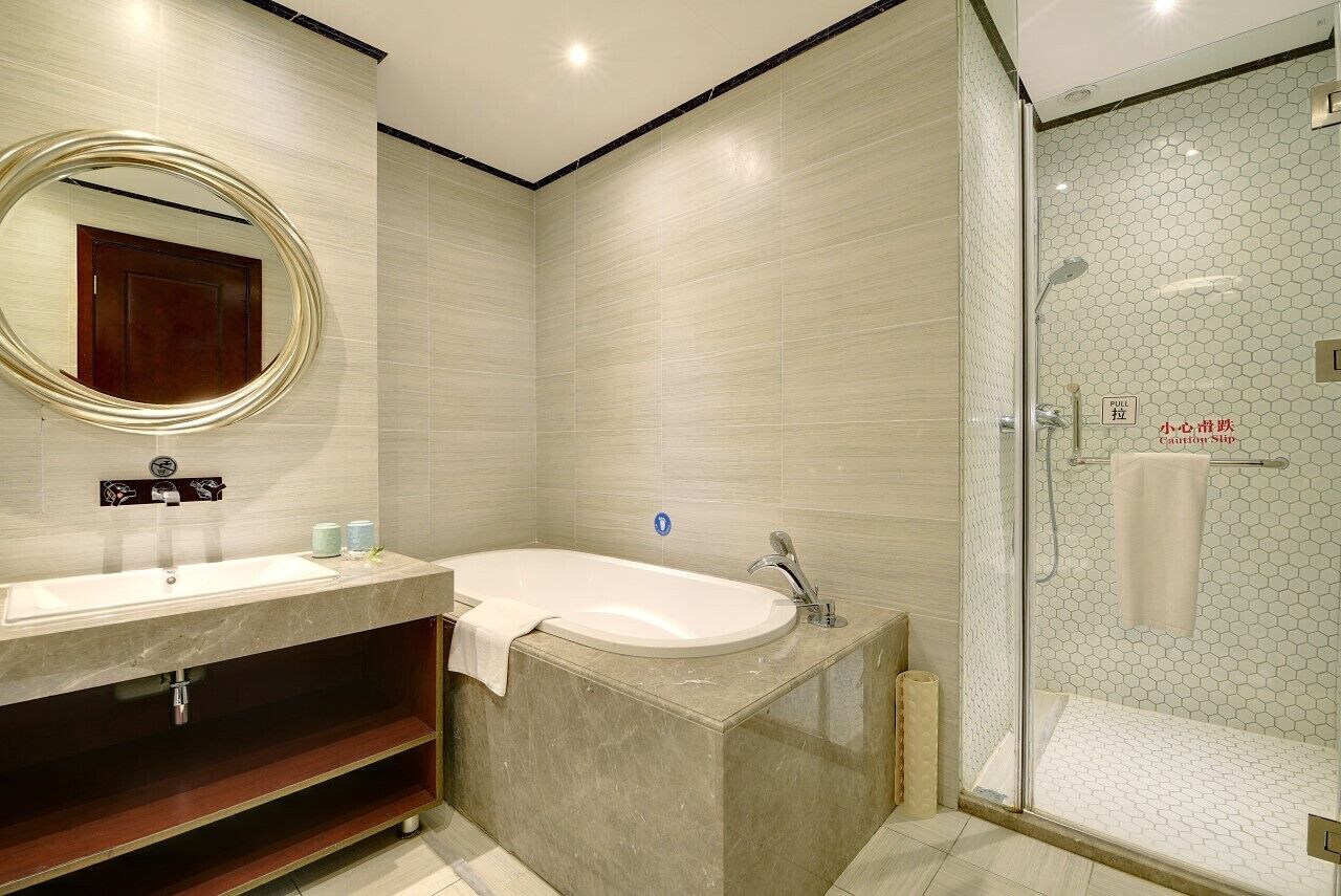 deluxe suite | bathroom | free toiletries, hair dryer, bathrobes, slippers