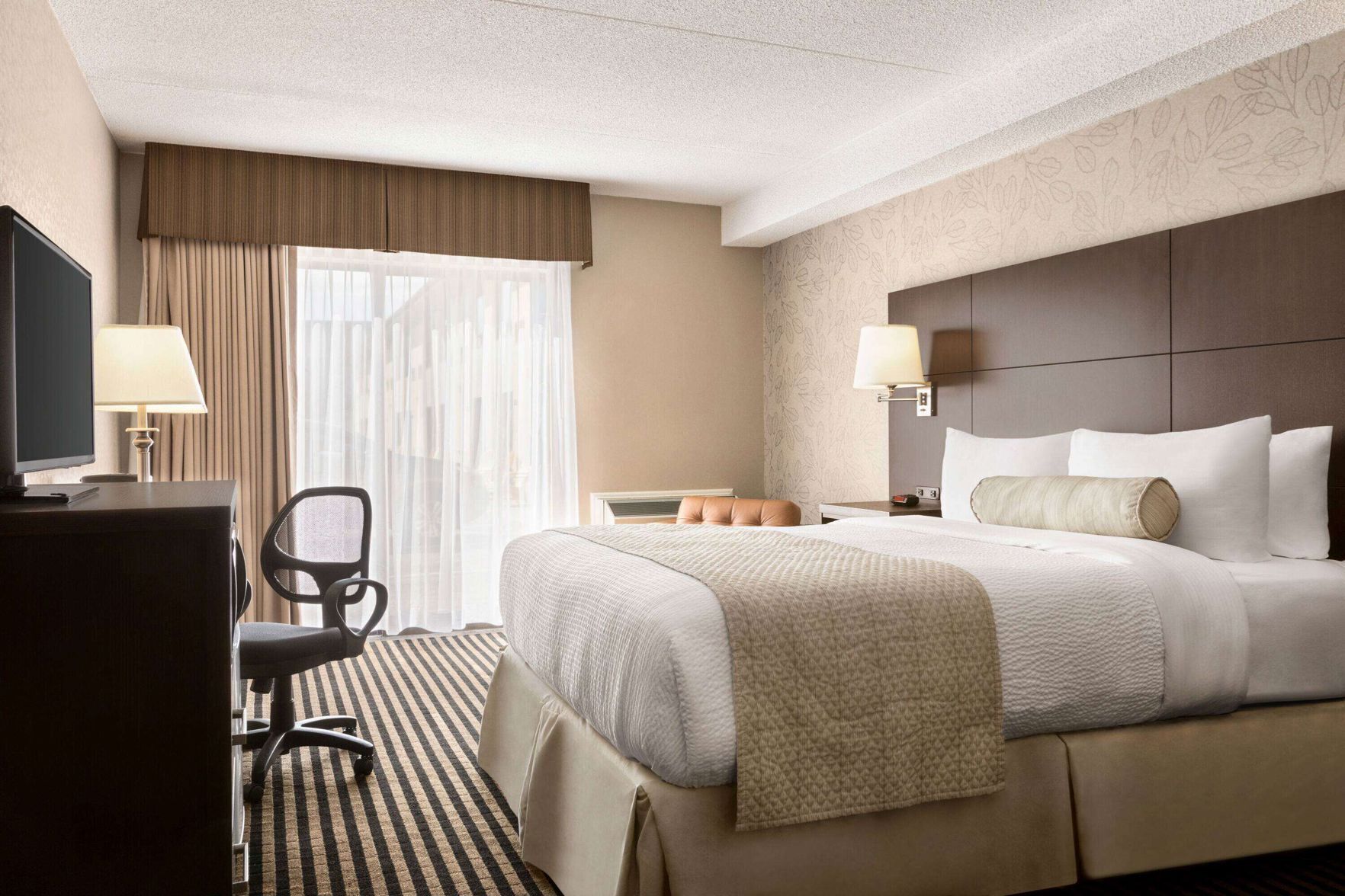 Pillowtop beds, desk, iron/ironing board, rollaway beds