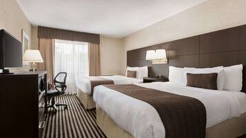 Pillowtop beds, desk, iron/ironing board, rollaway beds