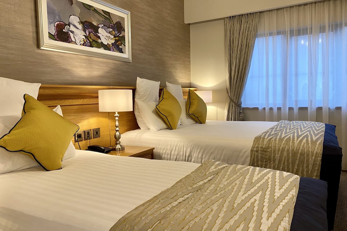 triple room | premium bedding, pillow-top beds, in-room safe, desk