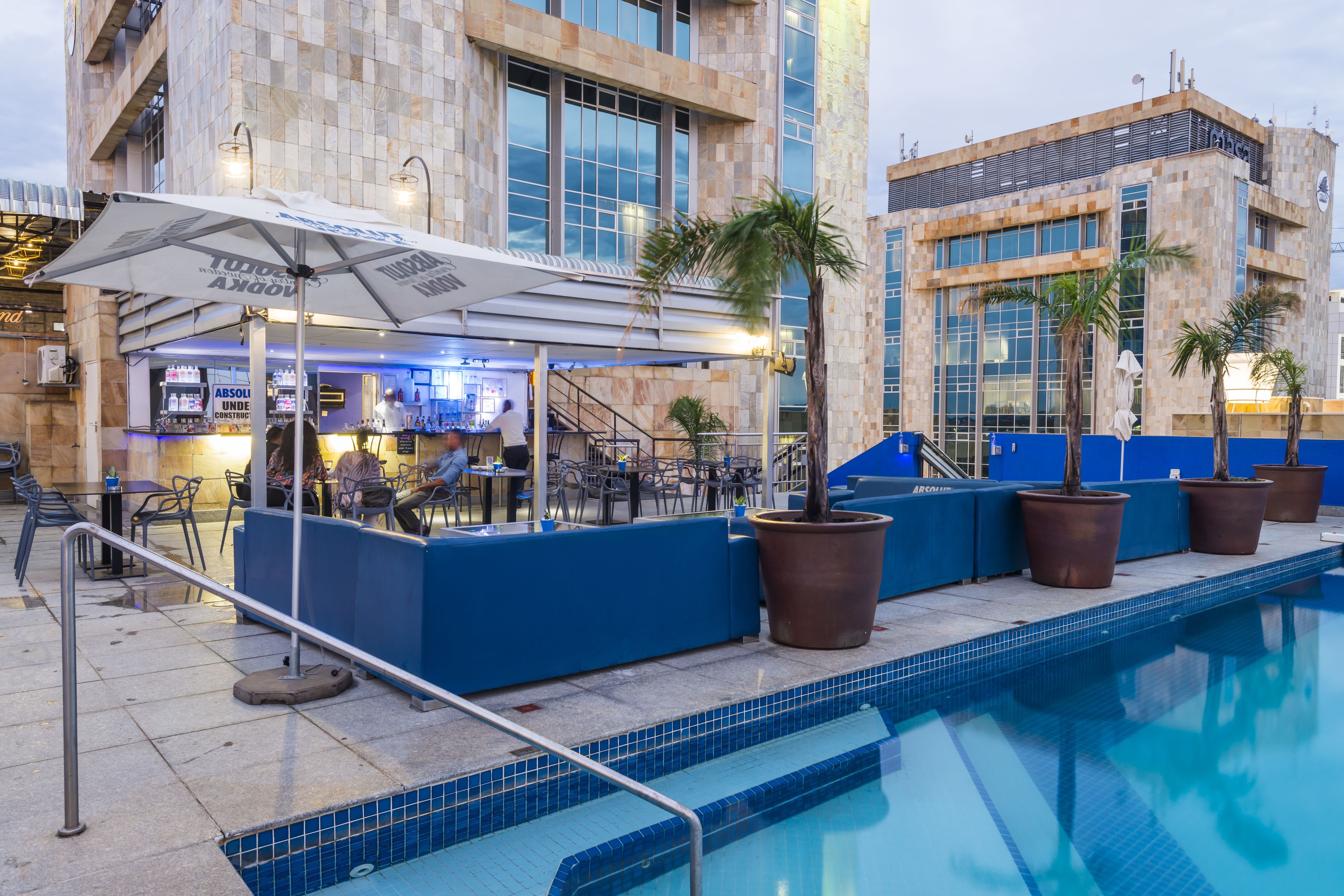 outdoor pool, pool umbrellas, pool loungers