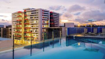 Outdoor pool, pool umbrellas, sun loungers