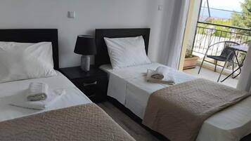 Apartment, 2 Bedrooms | 1 bedroom, individually decorated, iron/ironing board