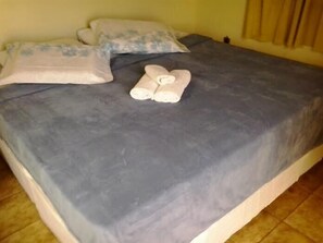 Suite Superior (pagamento só em dinheiro) | Minibar, tempat tidur lipat/tambahan, Wi-Fi gratis, dan seprai linen