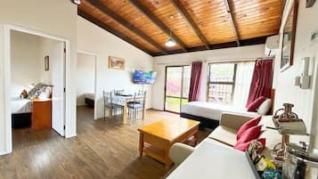 Family Room, 2 Bedrooms | Living area | 40-inch Smart TV with digital channels