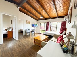 Family Room, 2 Bedrooms | Living area | 40-inch Smart TV with digital channels