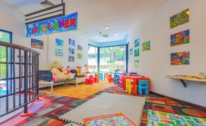 A children's playroom with colorful furniture, educational toys, and artwork on the walls. - Holiday Inn Resort Phuket Surin Beach by IHG (Choeng Thale)