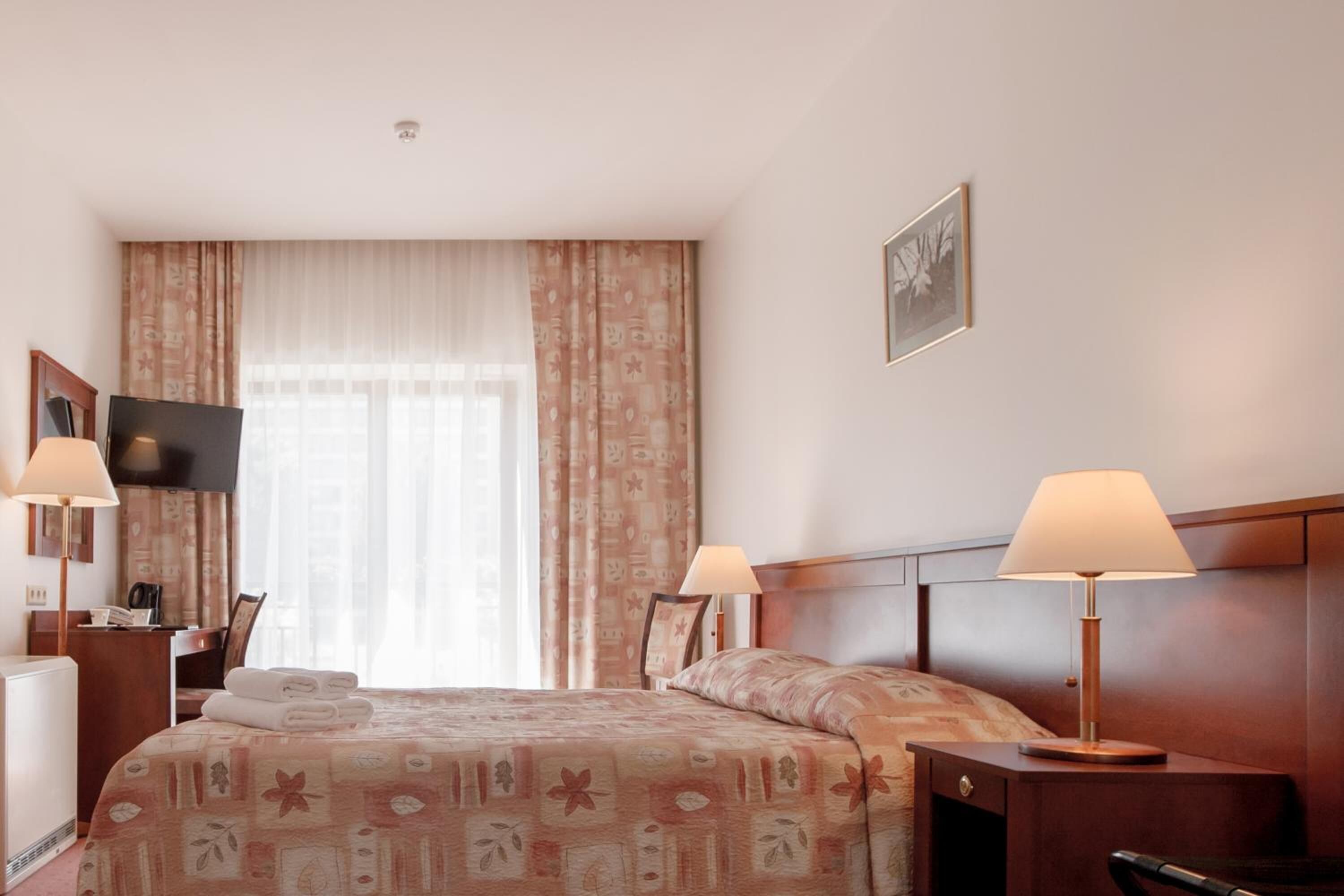 desk, blackout curtains, free wifi, bed sheets